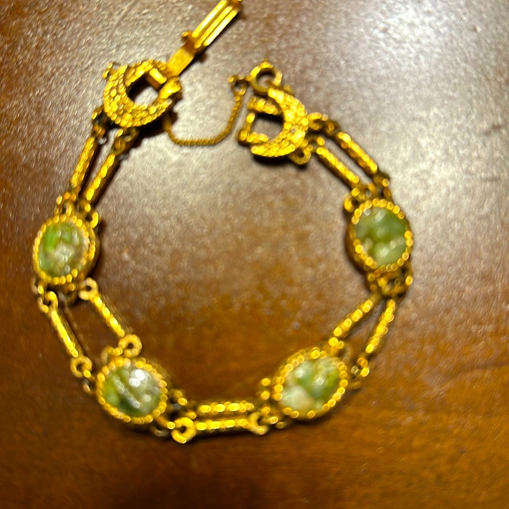 Beautiful women’s bracelet featuring amazing green stones.